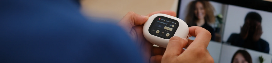 Person holding a RELOD TouchFit PRO with a case screen, connected to a video call interface.