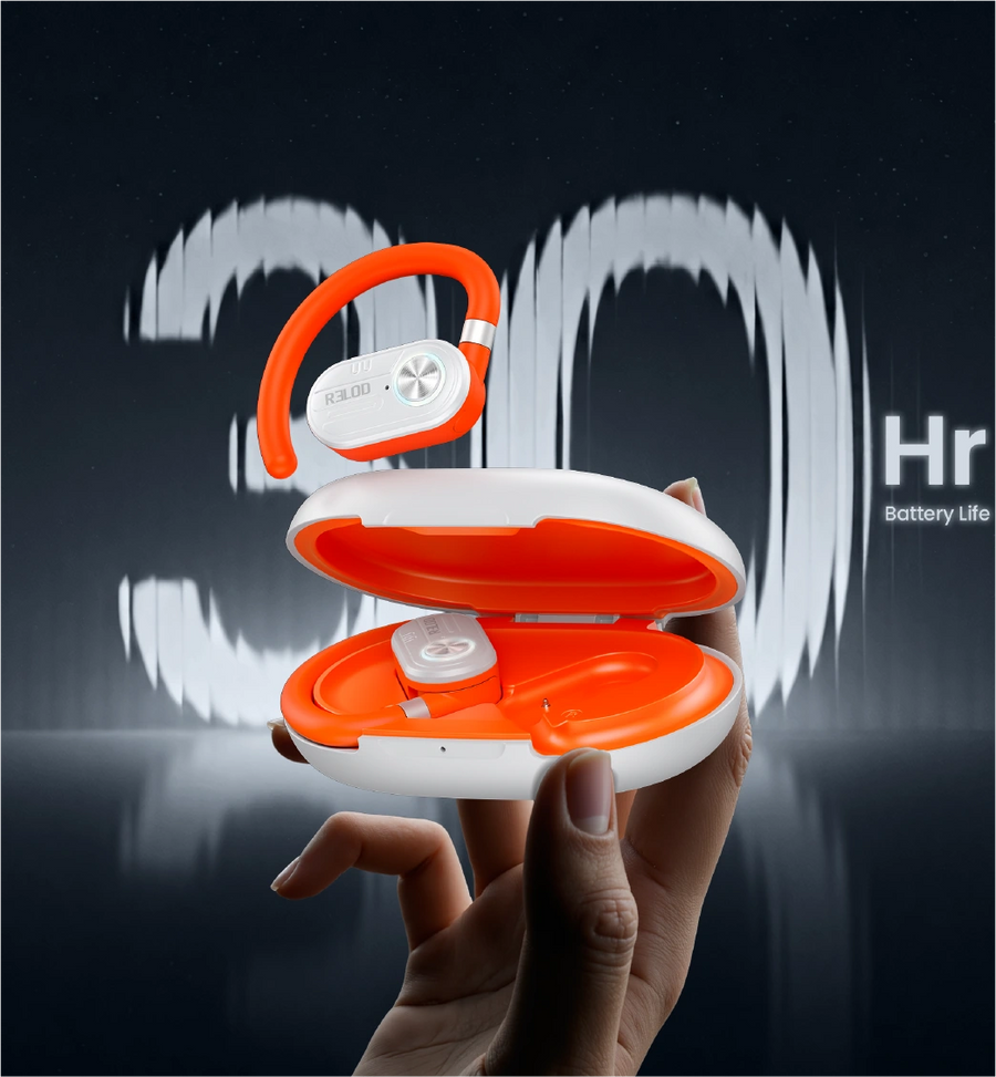 Hand holding orange and white RELOD TouchFit PRO wireless earbuds with charging case against a dark background