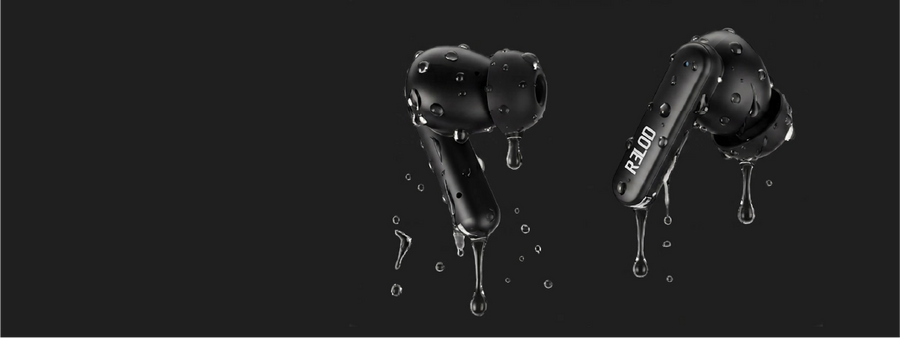 Black RELOD TouchBud earbuds with water droplets on a black background